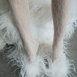 MÉDUSE EN PLUME BLANCHE