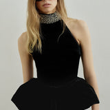 HEMINGWAY PEPLUM TOP IN IMPÉRIAL NOIR