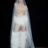 BOTTINES ILKYAZ EN PLUMES BLANCHES