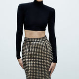 NIA TOP À LA TOMBE DE LA NUIT